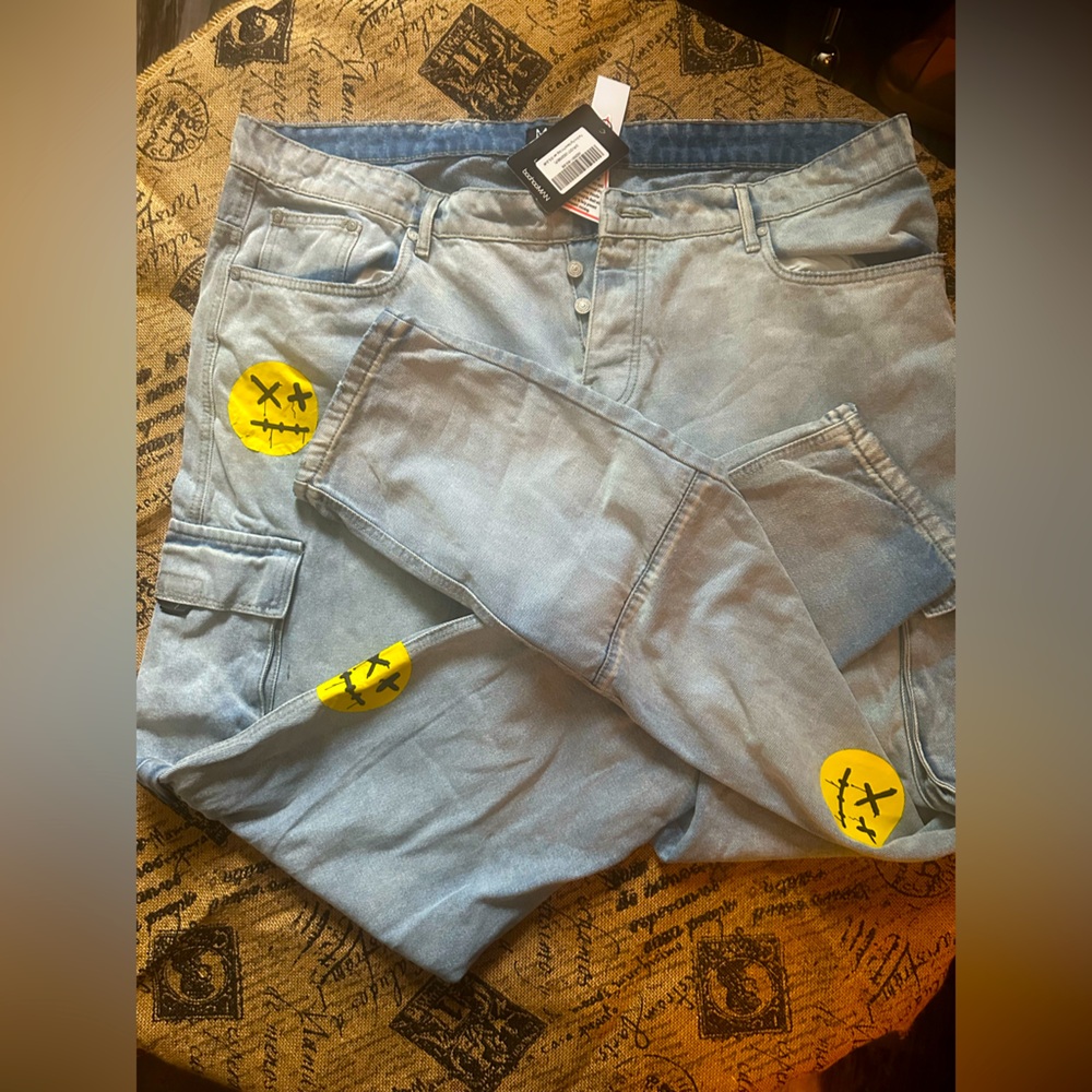 Stylish Blue Jeans with trippy smile patches